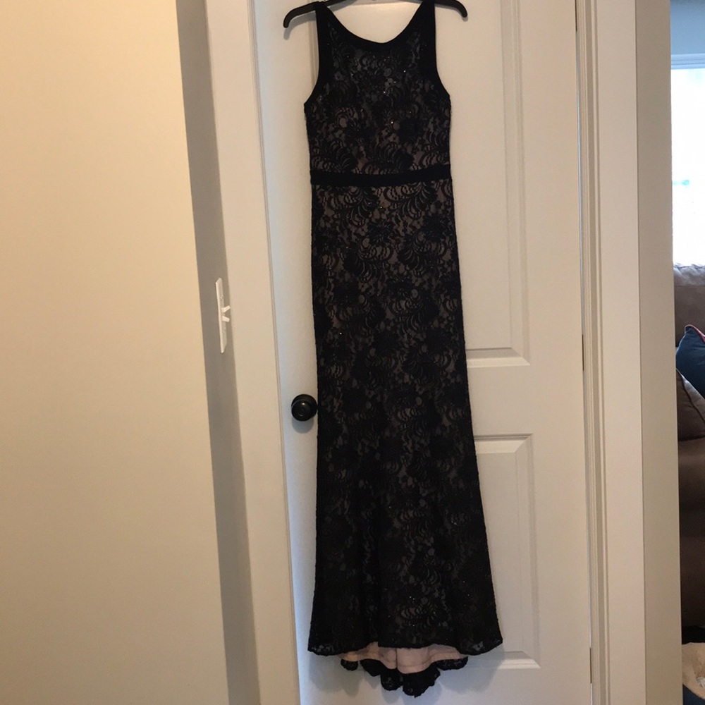 Black lace evening gown with nude underlay